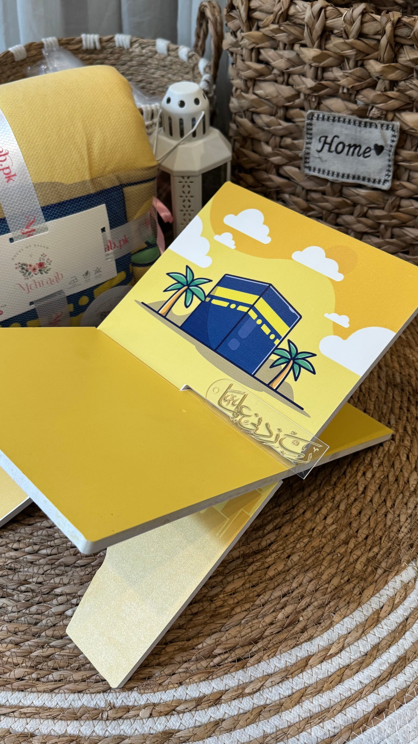 Rk12: Yellow Rehal with Kaaba illustration.