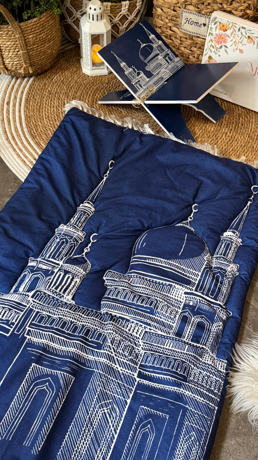 Ad08:Blue prayer mat with outline of mosque