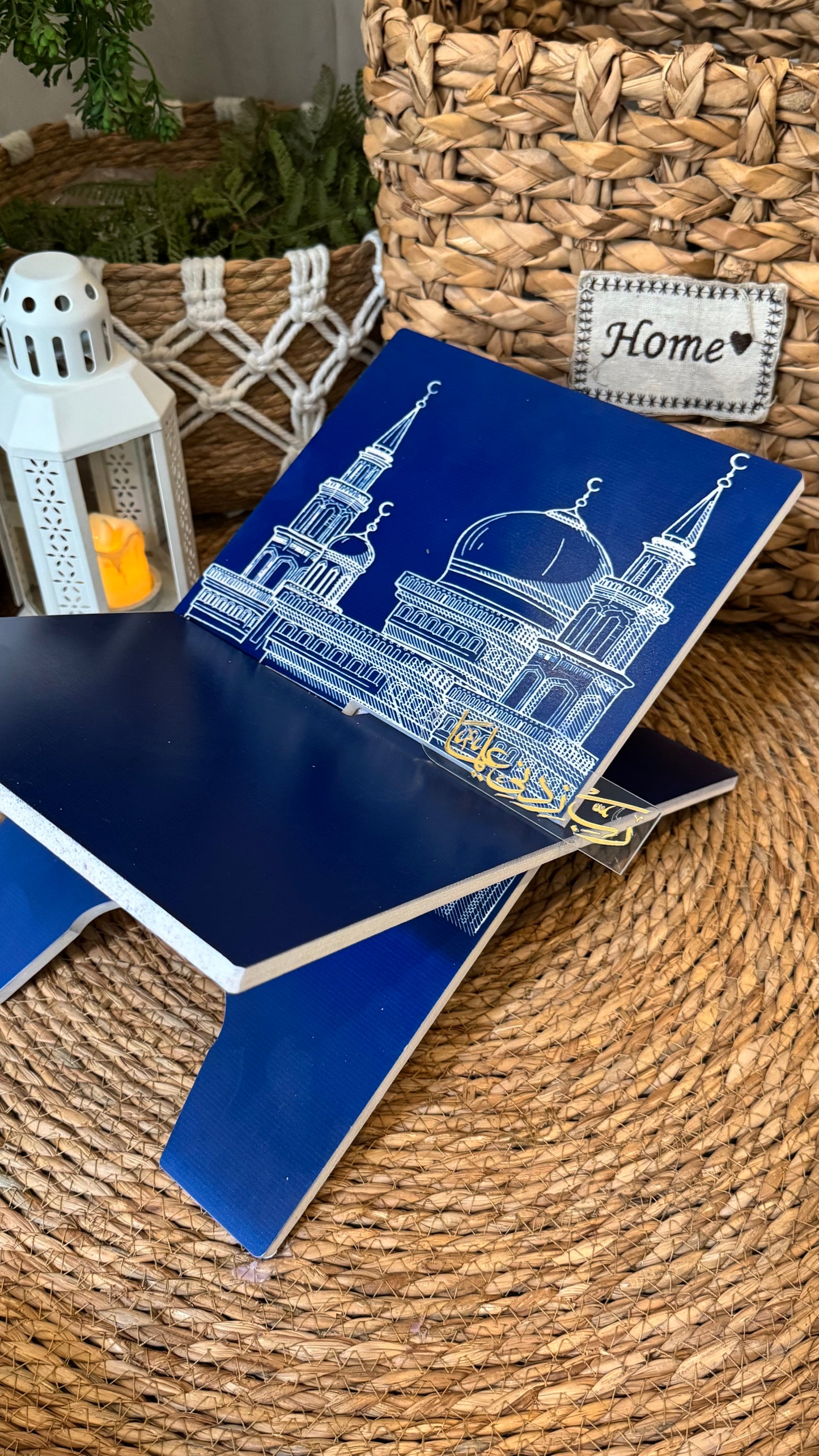 Ad08:Blue prayer mat with outline of mosque
