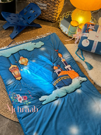 BBk:006(Kids):Blue prayer mat with kaba on clouds,matching Rehal,tasbeeh and bookmark.