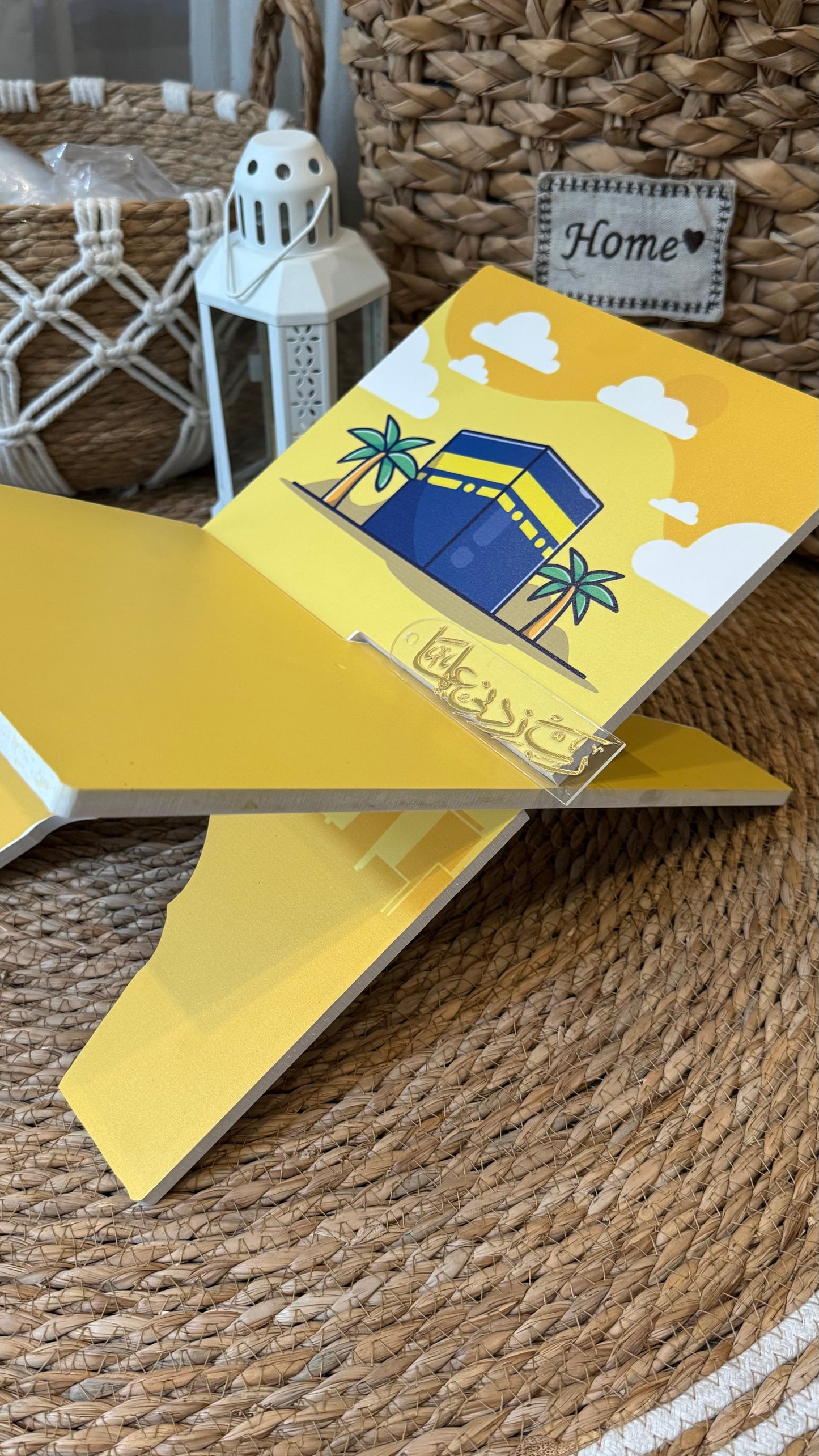 Rk12: Yellow Rehal with Kaaba illustration.