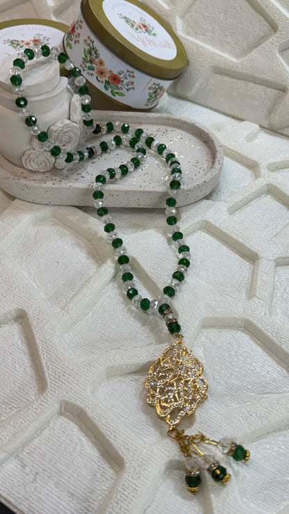 Green and white tasbeeh.