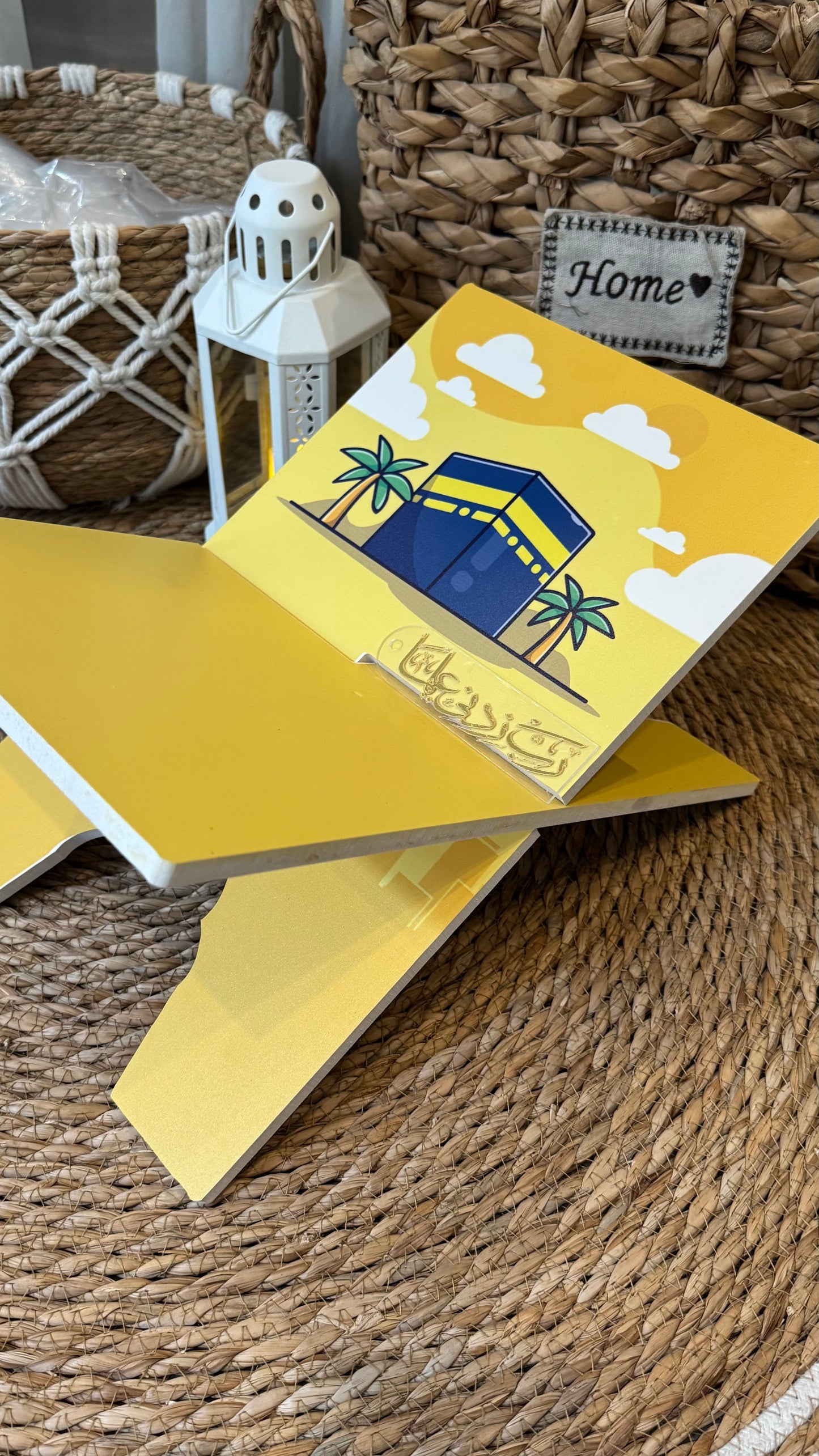 Rk12: Yellow Rehal with Kaaba illustration.