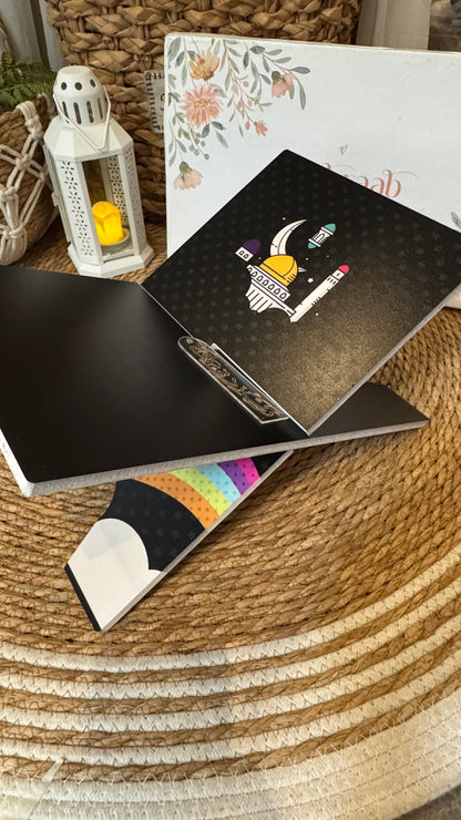 Rk07:Black Rehal with illustration of rainbow and clouds.