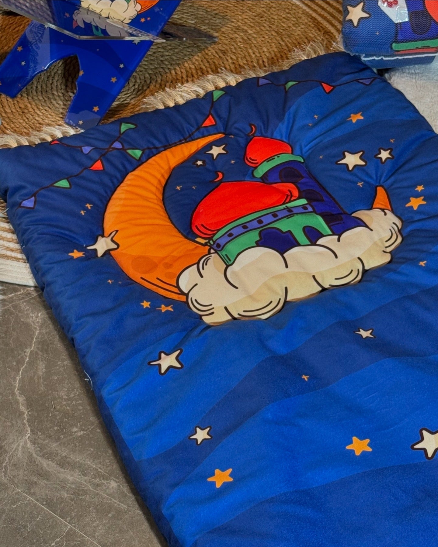 K26: vibrant blue colourful prayer mat.