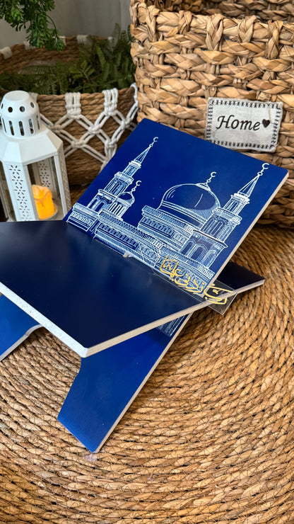 Ad08:Blue prayer mat with outline of mosque