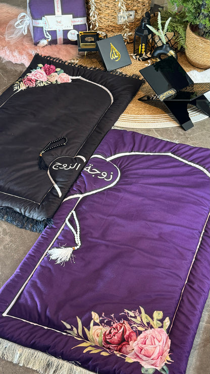 Purple and black couple prayer mats.