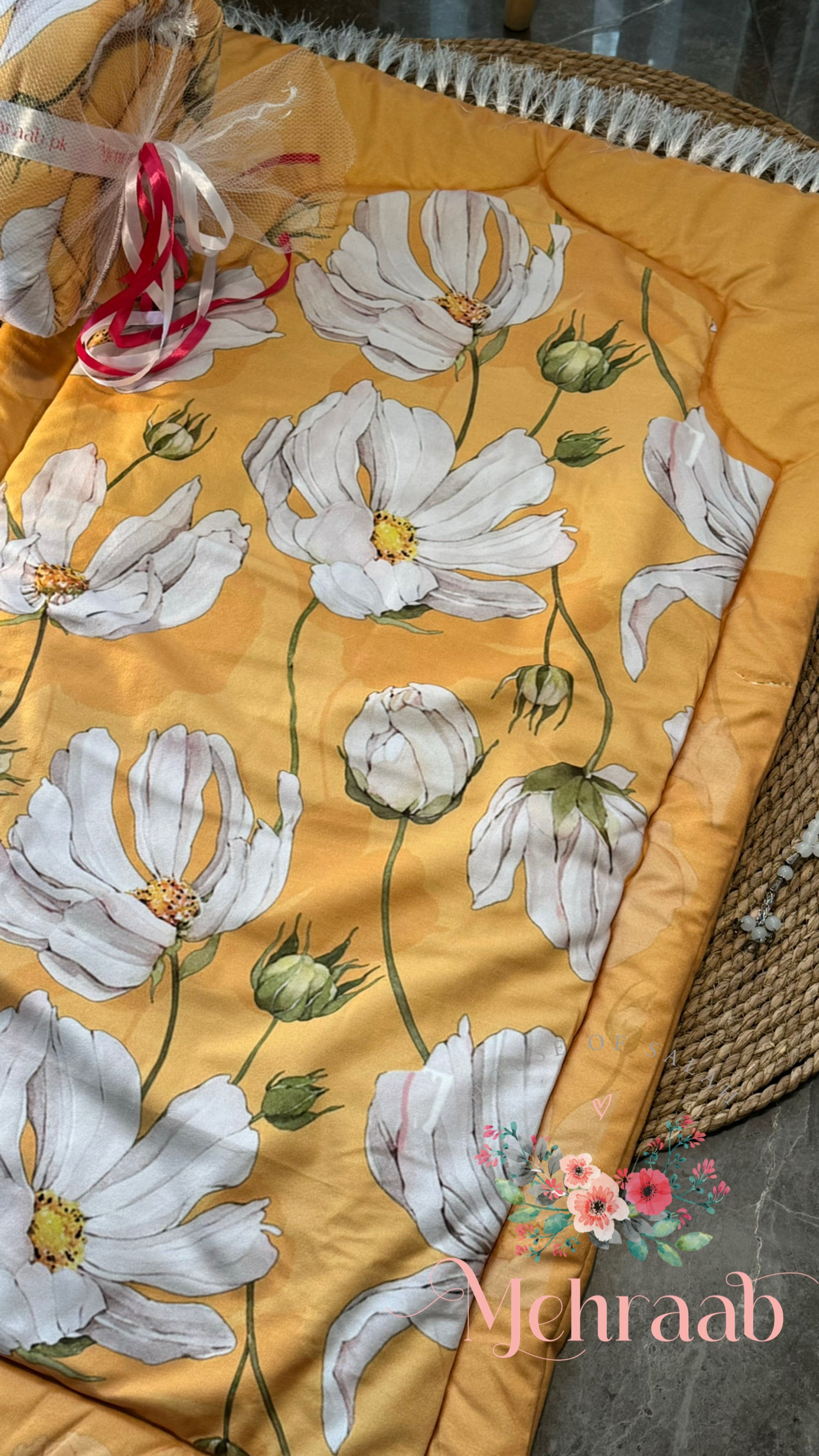 close up view of yellow janamaz with floral pattern