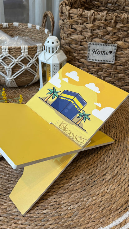 Rk12: Yellow Rehal with Kaaba illustration.