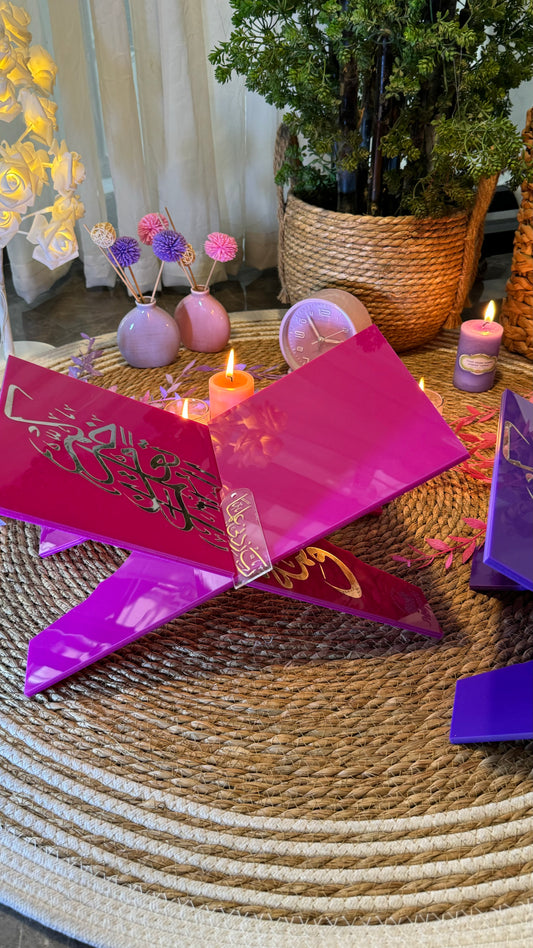 Pink rehal/quran stand.