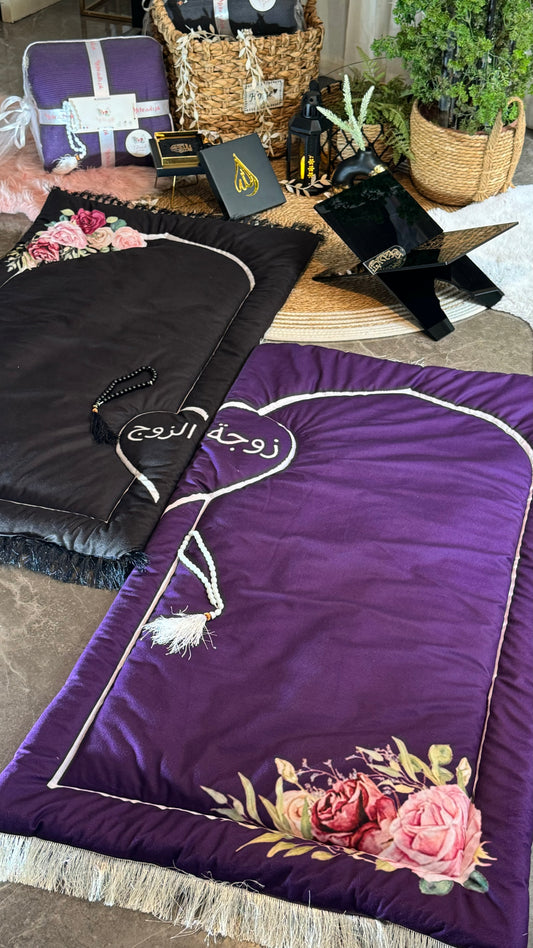 Purple and black couple prayer mats.