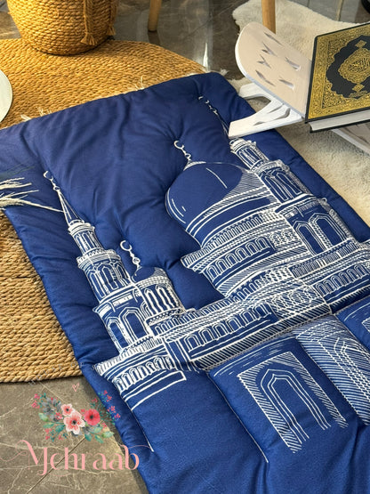 Ad08:Blue prayer mat with outline of mosque