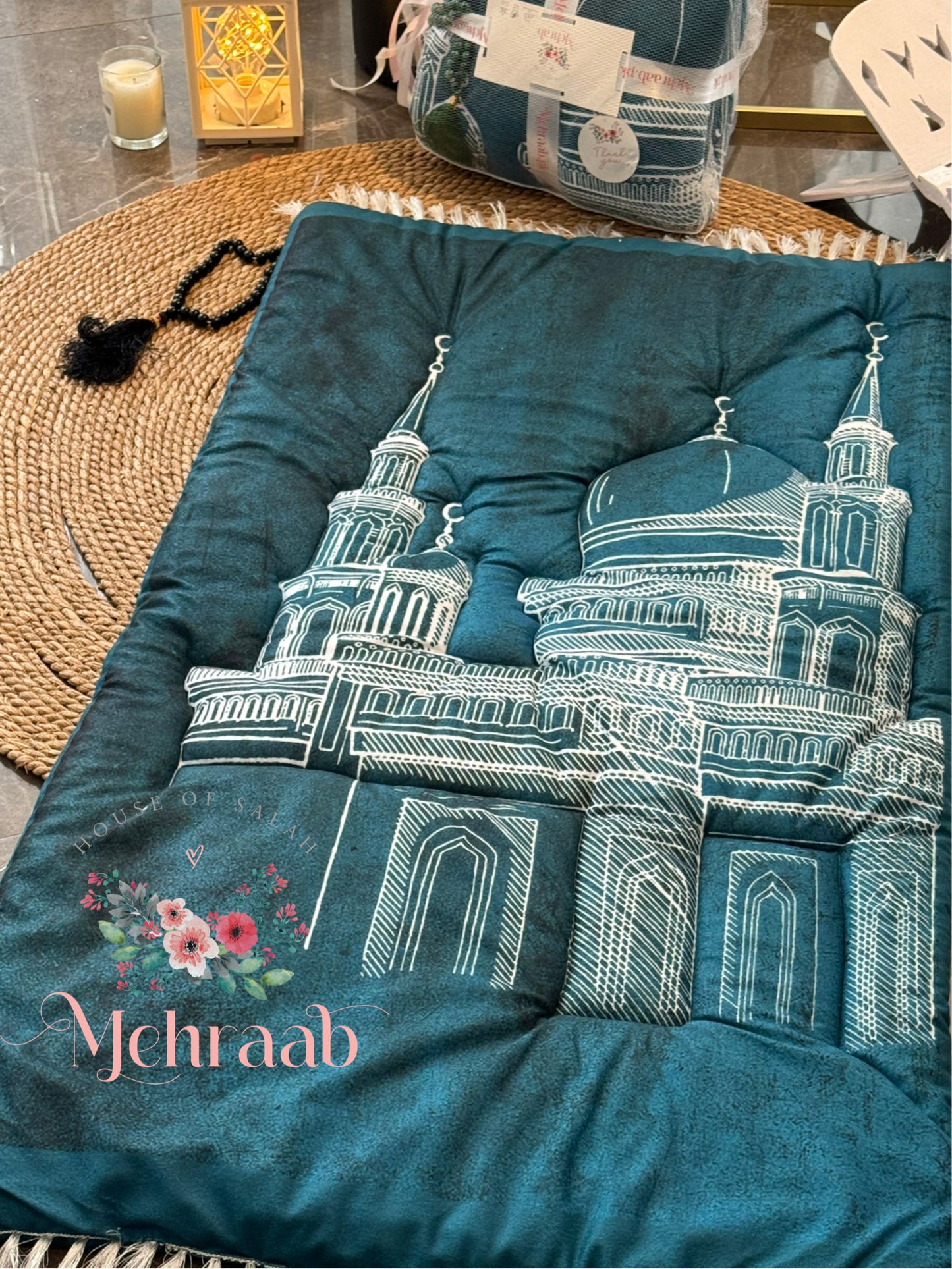 Ad02:Green prayer mat with mosque outline