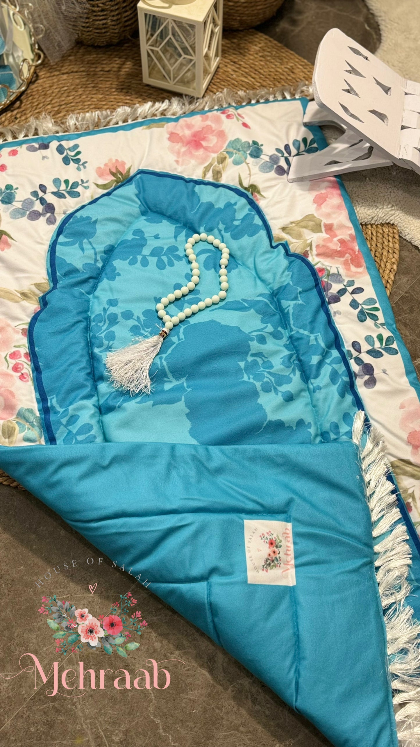 Ad07:Flowers pattern on sky blue janamaz with white border