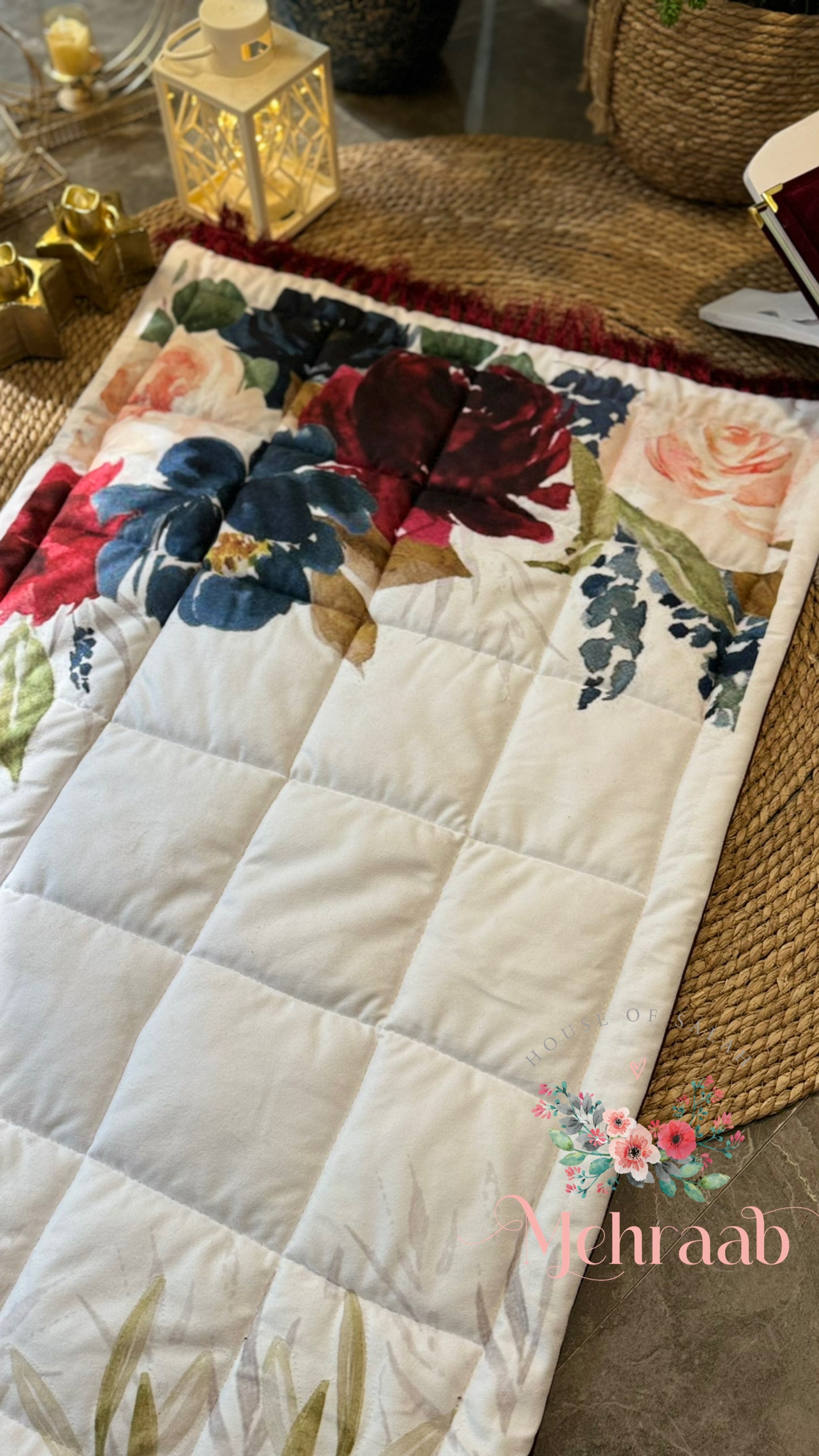 Colorful flowers on white prayer mat