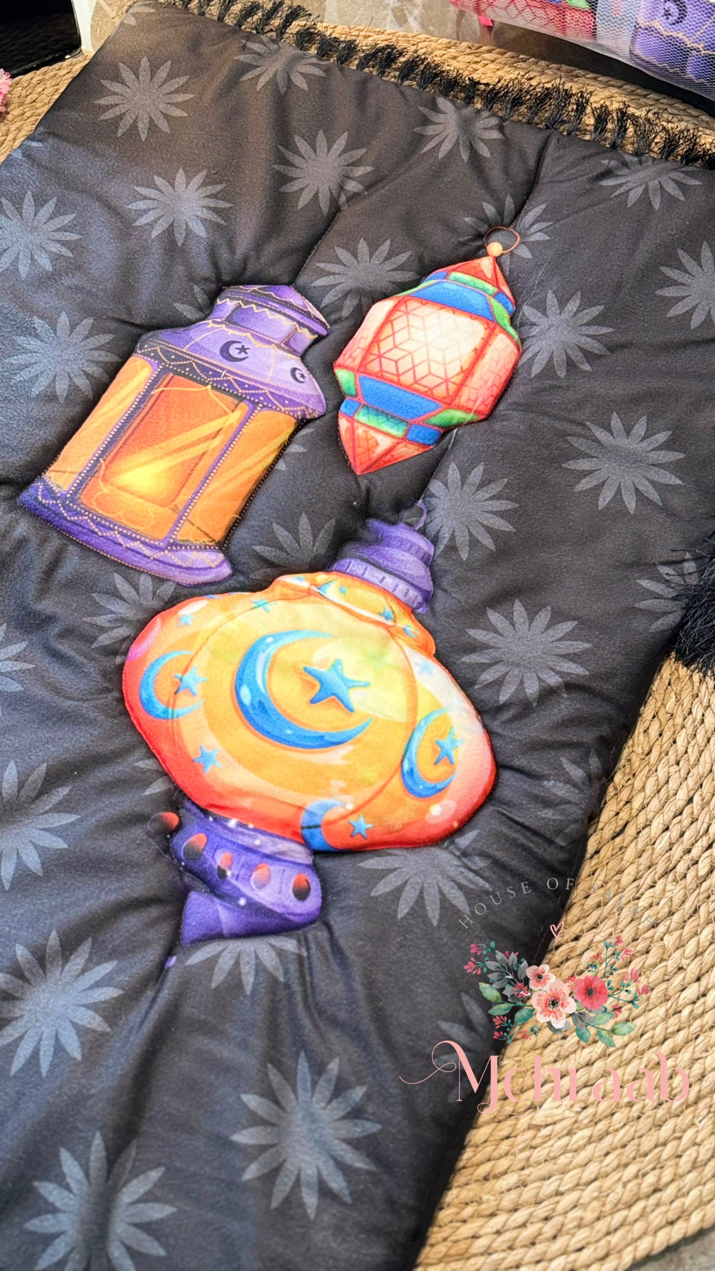 K20:Black prayer mat with colorful lanterns