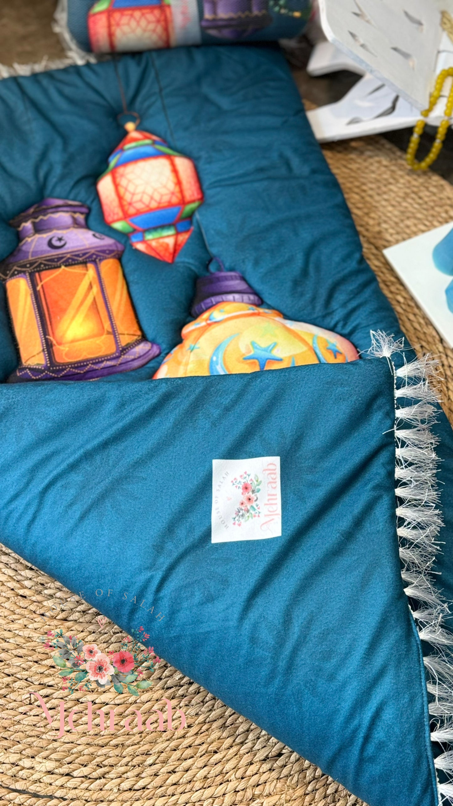 K17:Teal blue prayer mat with lanterns