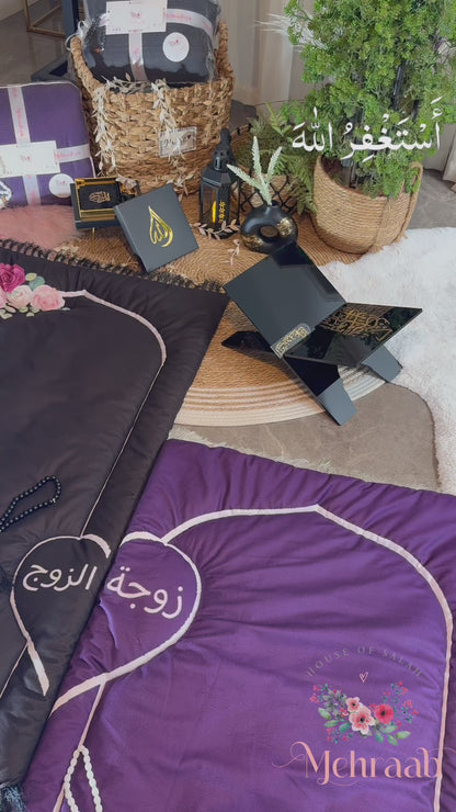 Purple and black couple prayer mats.