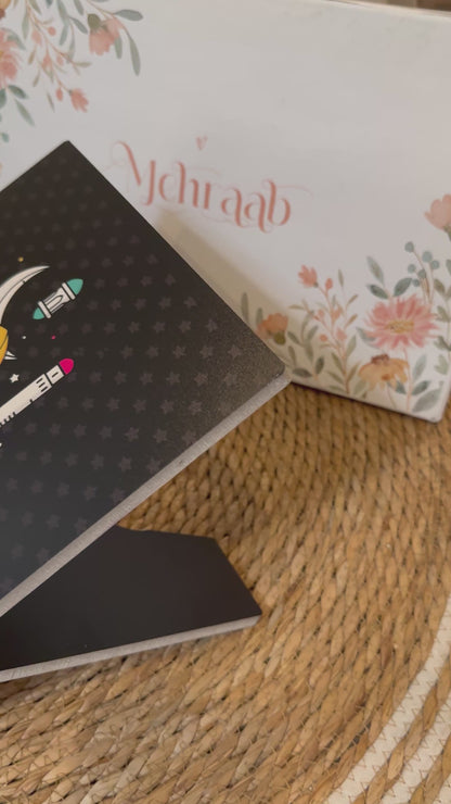 Rk07:Black Rehal with illustration of rainbow and clouds.